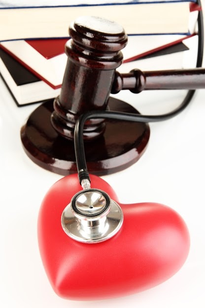 Gavel, stethoscope and a heart