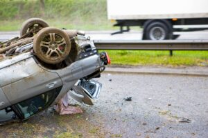 Overturned vehicle in the road.